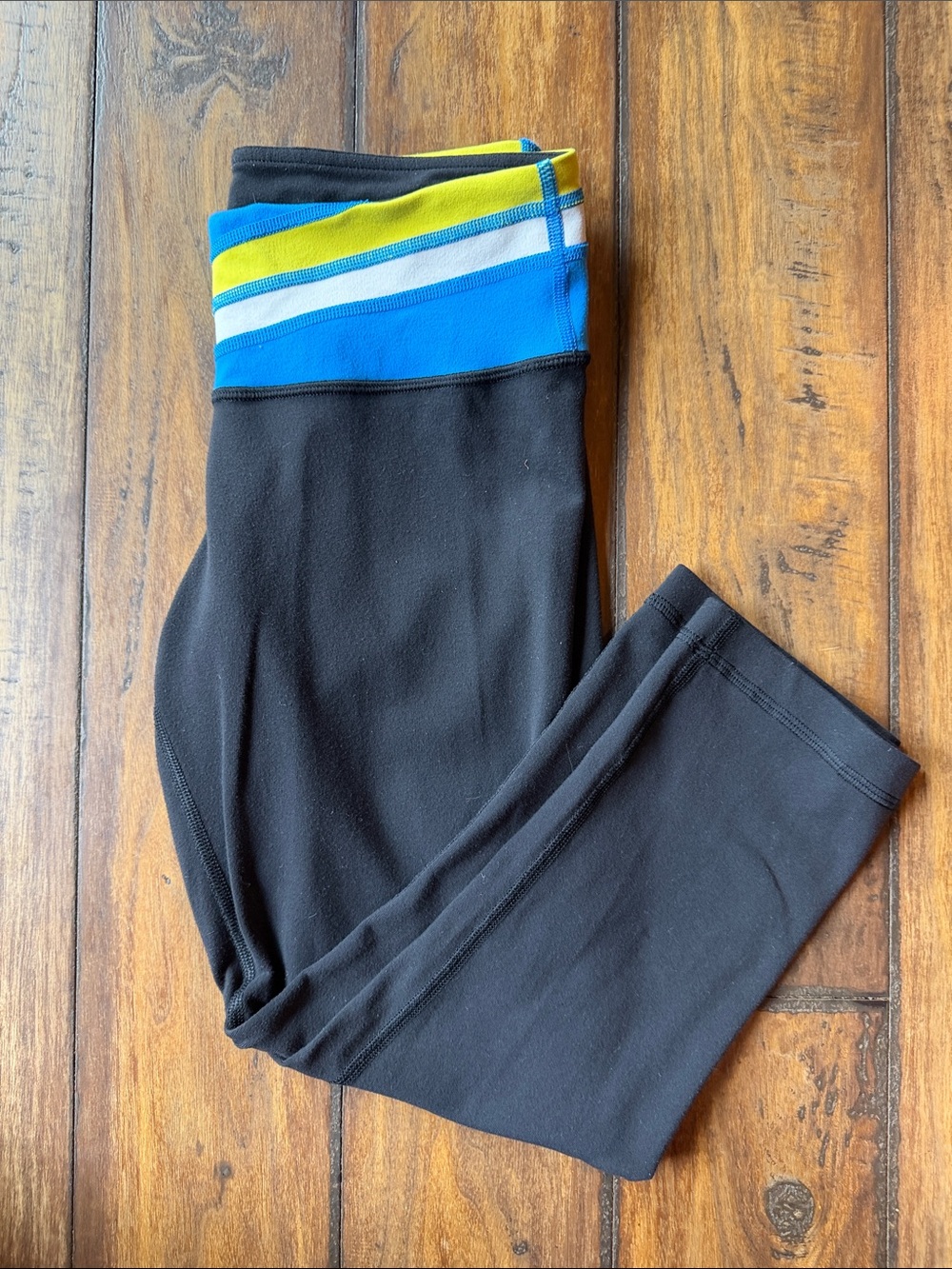 lululemon athletica Reversible Black Capris with Blue, White & Yellow Waistband